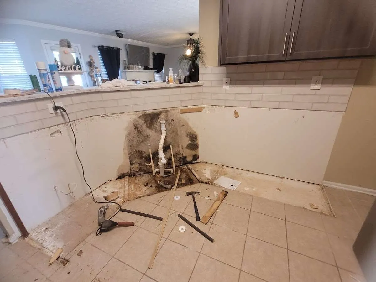 Mold behind wall with plumbing during Flood Damage Cleanup in New Canaan